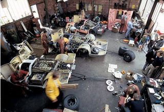 Illustration for article titled Porsche Le Mans works team at garage Provost